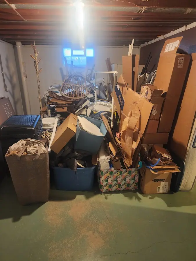 Roll-off dumpster container at job site for Construction Dumpster Rental in Holbrook